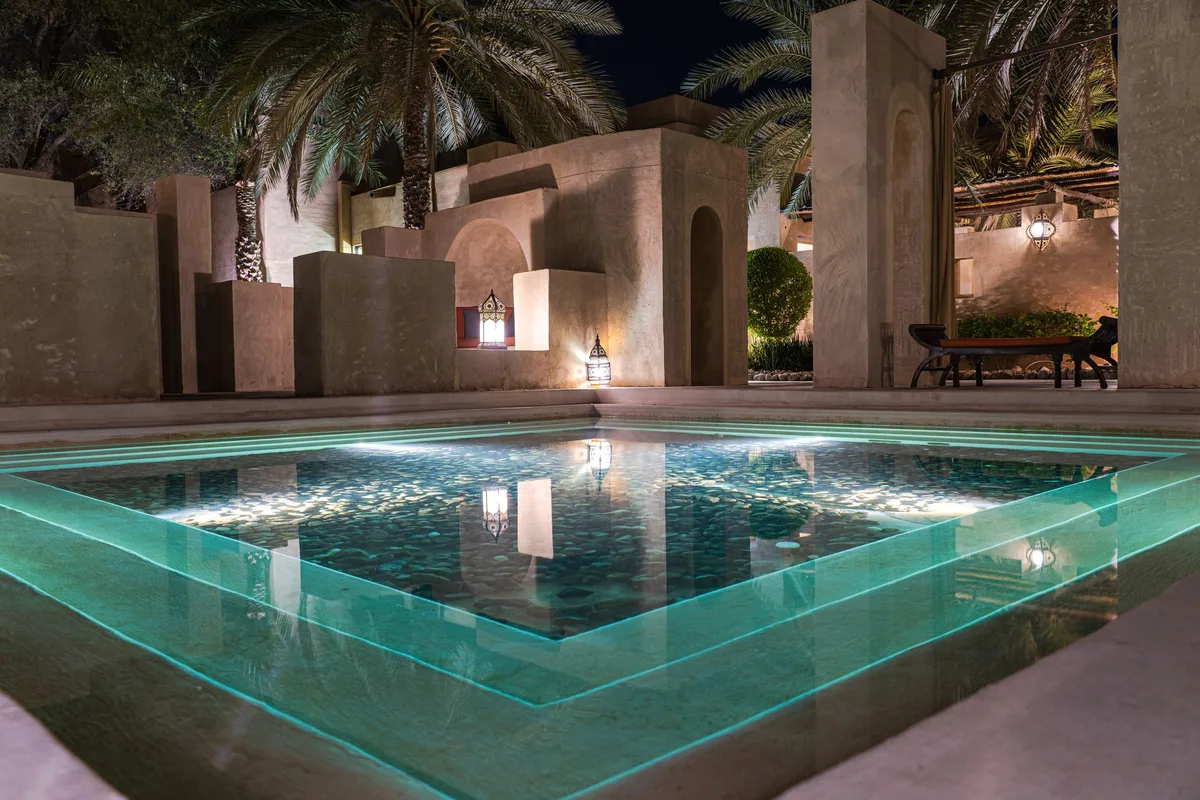 Pool lit at dusk